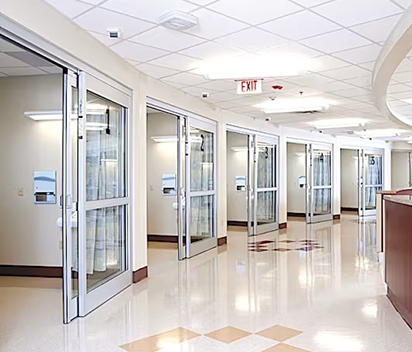 Manual sliding door provides room access in a full-open breakout