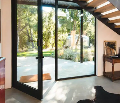 What is the difference between a swing door and a hinged door?