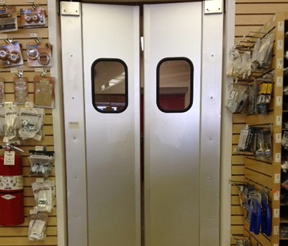 Noise-Reducing Swinging Traffic Doors for Hotel Service Areas